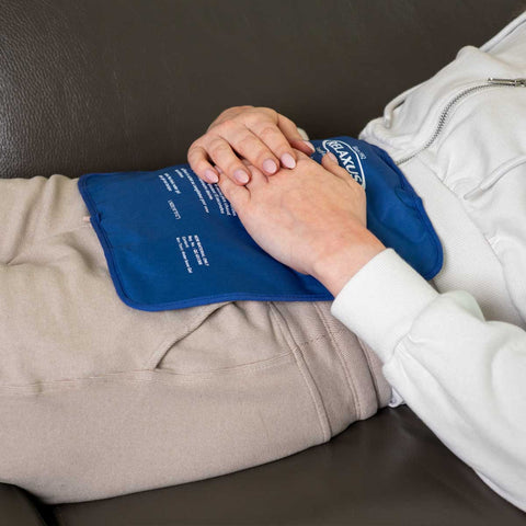 Woman using Relaxus Hot & Cold Gel Pack